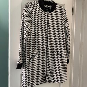 Longer style light weight jacket.